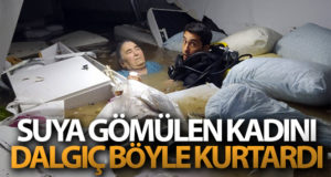 Su basan tıp merkezinin bodrumundaki kadını dalgıç polis kurtardı