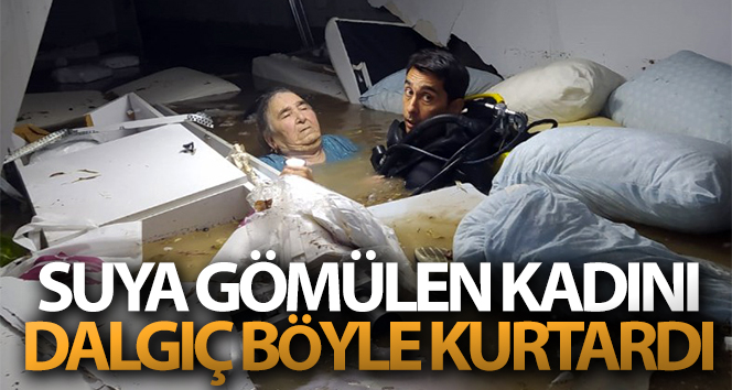 Su basan tıp merkezinin bodrumundaki kadını dalgıç polis kurtardı
