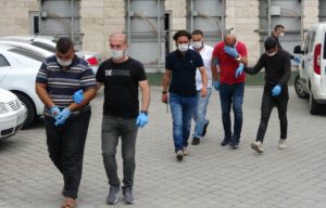 Telefonla eski rektörü 117 bin dolar dolandıran zanlılar adliyede